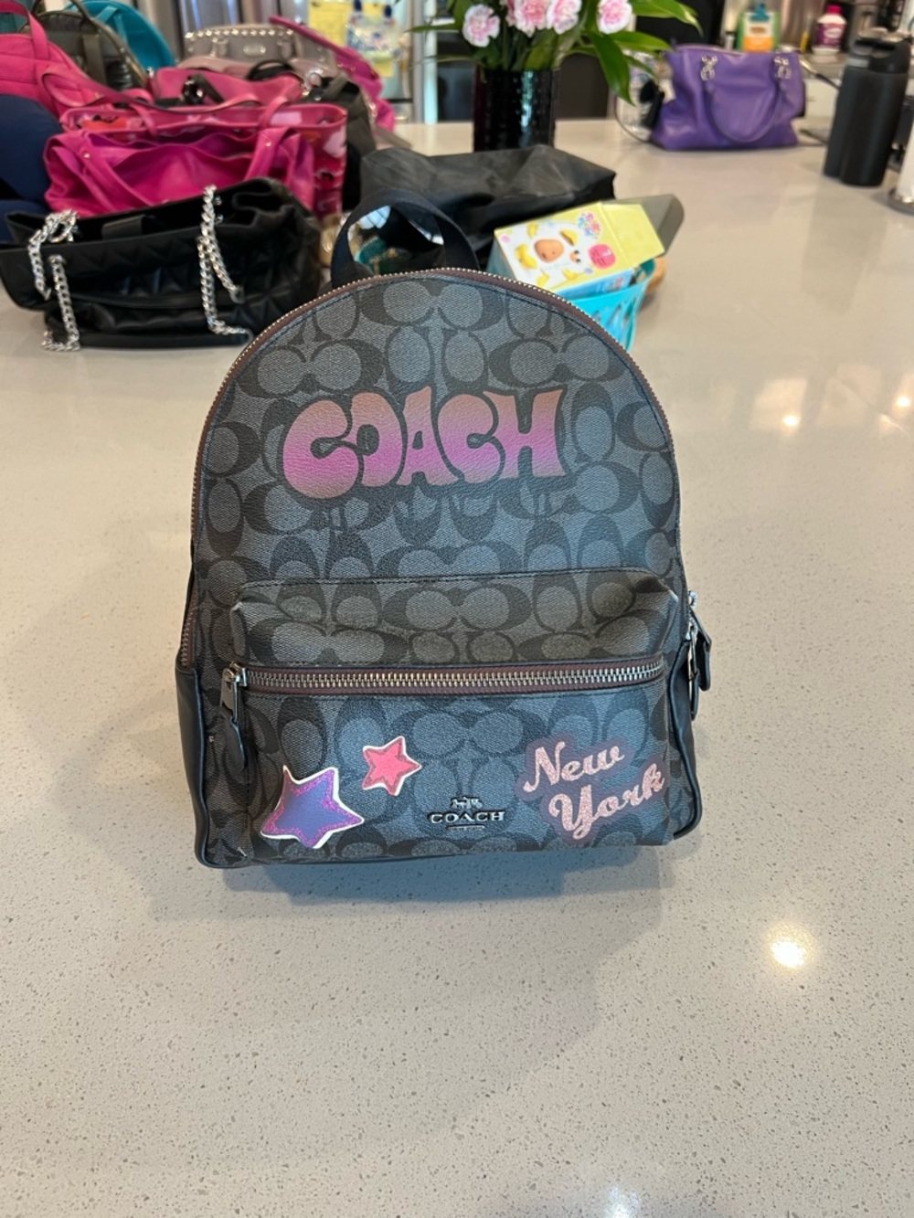 Coach Medium Charlie Backpack in Coach Signature Graffiti Canvas and Leather